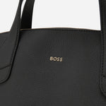 Close up of the BOSS Lenah Black Zip Tote Bag with Metal Logo.