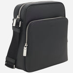 Side view of the BOSS New Crosstown NS Reporter Bag in Natural-Grain Black Leather with Zip.