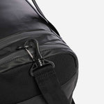 Side view of the Stormy Black Recycled Polyester Holdall with Black BOSS Logo.