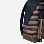 Side view of the Paul Smith Multistripe Recycled Nylon Backpack with Signature Logo Patch.