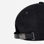 The adjustable strap on the Men's Anson Grey Merino Wool Blend Cap.