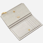 Inside the Coin Street Snow Faux Croc Leather Medium Bifold Zip Top Purse.