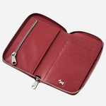 Inside the Pockets Carmine Leather Medium Zip Around Purse.