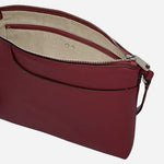 Inside the Pockets Carmine Red Leather Small Zip Top NS Cross Body Bag.