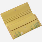 Inside the Radley Spring Blooms Raffia and Leather Large Flapover Purse.