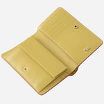 Inside the Radley Spring Blooms Raffia and Leather Medium Bifold Purse.