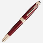 The Montblanc Burgundy Red Meisterstück Solitaire Golden Hour LeGrand Fountain Pen with cap on.