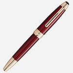 The Burgundy Red Meisterstück Solitaire Golden Hour LeGrand Rollerball Pen with cap on.