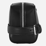 Side view of the Meisterstück Smooth Black Leather Wash Bag with Strap and Nib-Shaped Detailing.