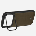 The holder/stand at the back of the Montblanc Khaki Sartorial Leather Hardshell Case for iPhone 17 Pro.