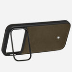 The holder/stand at the back of the Montblanc Khaki Sartorial Leather Hardshell Case for iPhone 17 Pro Max.