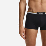 Close up of the BOSS 3-Pack of Black Cotton Blend Motion Boxer Shorts with Three Stripe and Logo Waistband.