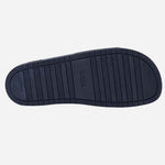 Bottom of the Aryeh Navy Blue Italian Made Slides with Large Black Logo.