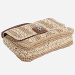 The base of the BOSS Beyond Raffia Cross Body Bag with Brown Trims and Double 'B' Monogram Logo.