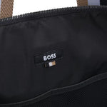 Inside the Catch 3.0 Black Polyester Holdall with Signature Stripe Handles.