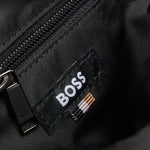 Inside the BOSS Catch 3.0 Black NS Zip Top Cross Body Bag with Raised White Logo.