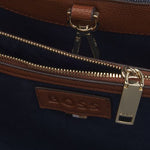 Inside the Cotton-Denim Anett Tote Bag with Double 'B' Monogram.