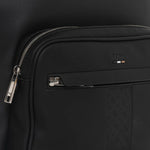 Front zipped pocket and zipped pouch on the Ray MS Black Backpack with Three Stripe and Patterned Detail.