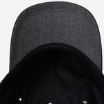 Under the peak of the Men's Anson Grey Merino Wool Blend Cap.