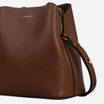 Side view of the Dukes Place Textured Chocolate Brown Small Compartment Cross Body Bag.
