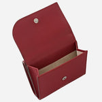 Inside the coin pocket of the Pockets Carmine Red Leather Small Trifold Purse.
