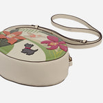 Side and base view of the Radley RHS Orchid House Small Leather Ziptop Cross Body Bag.