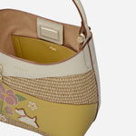 Top view inside the Radley Spring Blooms Raffia and Leather Small Open Top Cross Body Bag.