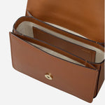 Inside The Belsize Toffee Brown Leather Small Flapover Shoulder Bag.