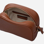 Inside the Radley The Daily Cognac Leather Small Zip Around Cross Body Bag.