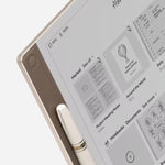 Close up of the 64 GB Digital Paper Tablet in Elixir Gold with Digital Pen.