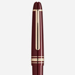 The cap and clip of the Meisterstück Burgundy Red Midsize Ballpoint Pen.
