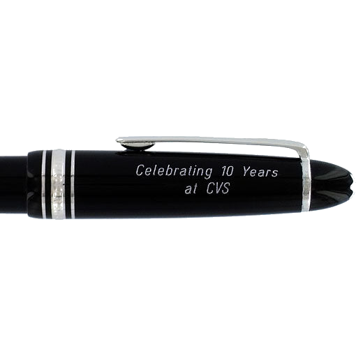 An engraved Montblanc pen cap in grotesque italics.