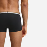 Close up of the BOSS 3-Pack of Black Cotton Blend Motion Boxer Shorts with Three Stripe and Logo Waistband.