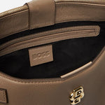 Inside the Beyond Beige Grained Leather Tote Bag with Double 'B' Monogram.