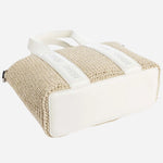The base of the BOSS Becky White Raffia Mini Tote Bag with Zip.