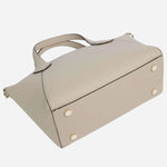 The base of the BOSS Lenah Beige Zip Tote Bag with Metal Logo.