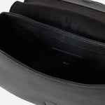 Inside the BOSS Salley Black Saddle Bag with Metal Logo.