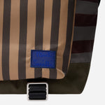 Paul Smith signature logo patch on the front of the Paul Smith Multistripe Recycled Nylon Backpack with Signature Logo Patch.