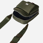 Inside the Paul Smith Green Recycled Nylon Small Flight Bag with Signature Stripe Trims.