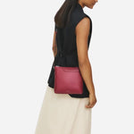 The Pockets Carmine Red Leather Small Zip Top NS Cross Body Bag by Radley.