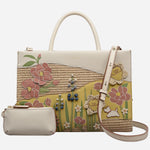 The Radley Spring Blooms Raffia and Leather Medium Ziptop Multiway Bag with removeable pouch.