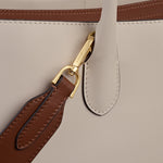Radley branded gold-tone hardware on the Radley The Romilly Salt Leather Large Ziptop Multiway Bag.