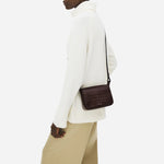 The Westwell Lane Faux Croc Dark Oak Small Flapover Cross Body Bag by Radley.