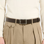 The ebony Sartorial leather side of the Montblanc 35 mm Rectangular Pin Buckle Reversible Black and Ebony Sartorial Leather Belt.