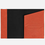 Inside the Montblanc Sartorial Tangerine Leather Passport Holder.