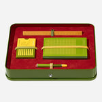 The green metal presentation box for the The nib of the Heritage Collection Rouge et Noir “Baby” fountain pen from the Wes Anderson for Montblanc Limited Edition The SCHREIBERLING 1969 Fountain Pen Set.