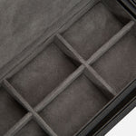 Cufflink compartments inside the Howard Black Leather Valet Tray with Roll.