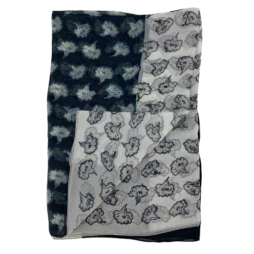 This Paul Smith scarf is made from a silk material in a floral black and white pattern.