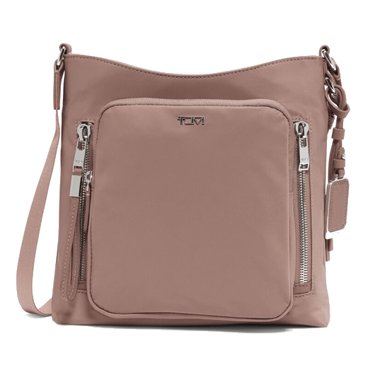 TUMI's Voyageur Mauve Tyler Crossbody Bag has polished silver hardware with the TUMI branding on the front.