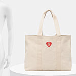 The BOSS Becky Beige Tote with Hugo Heart Logo by BOSS.